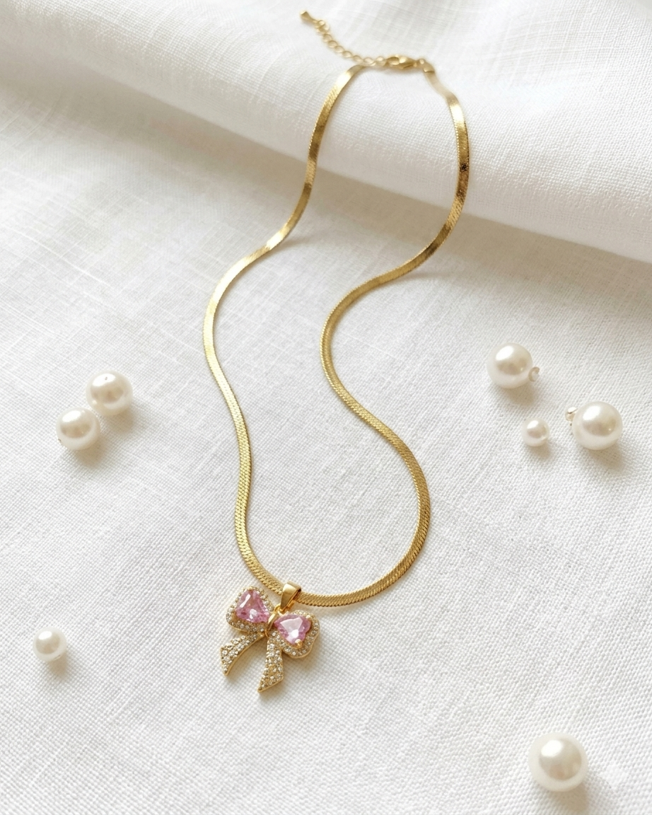 Luminous Gilded Bow Pendant