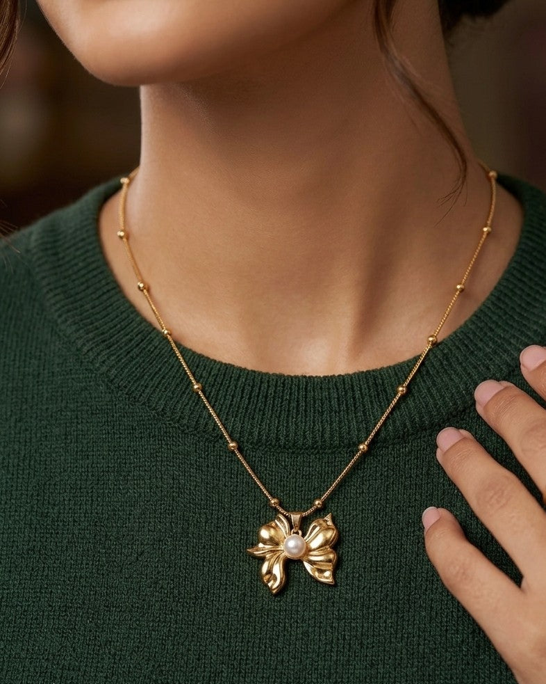 Luminous Gilded Bow Pendant